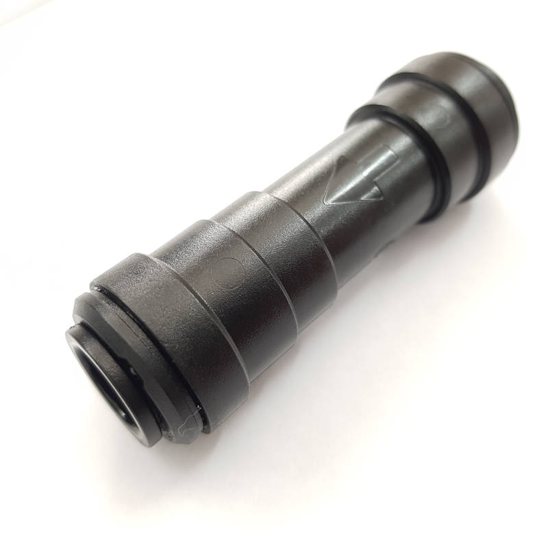 Black plastic fitting on a white background