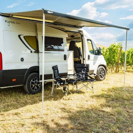 A white awning by a vehicle