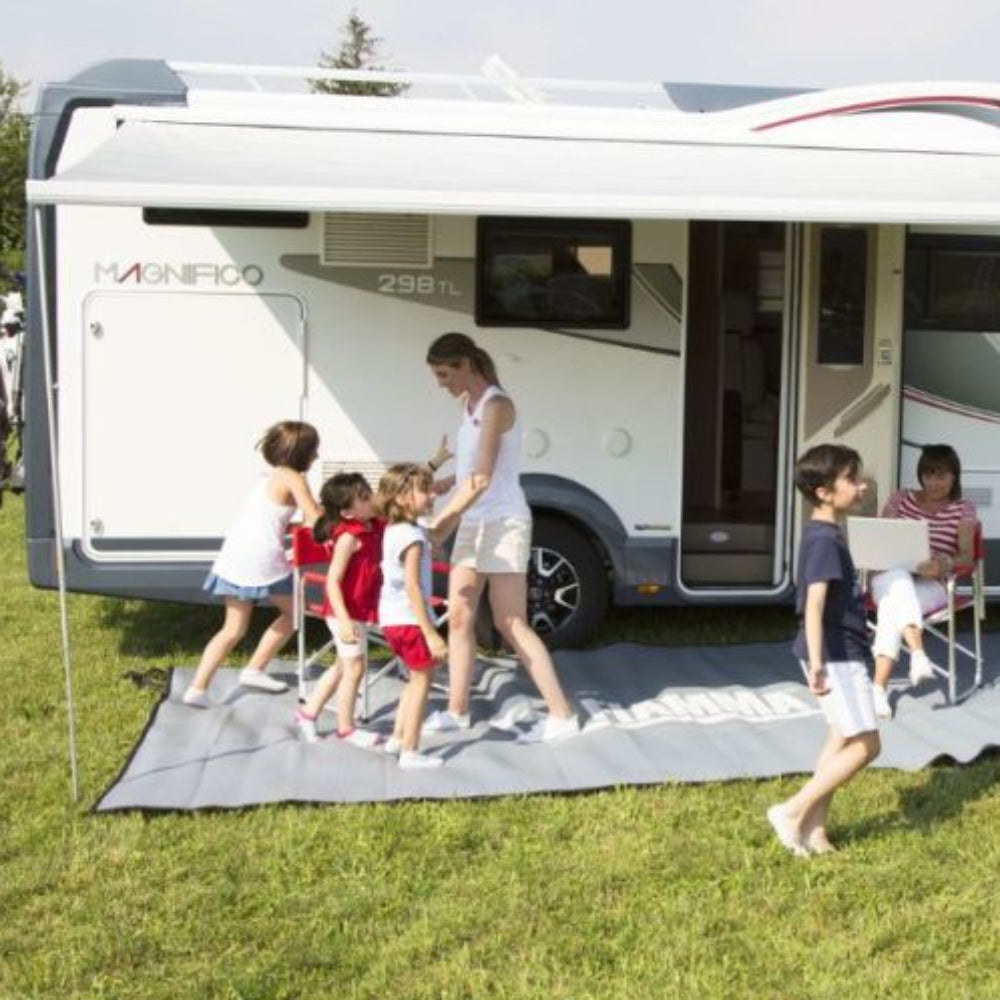 Family shading underneath a Fiamma Awning