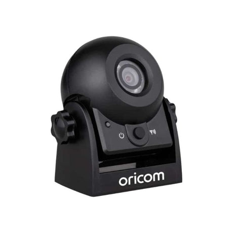 A black Oricom wireless camera with visible control buttons and a mounting bracket.