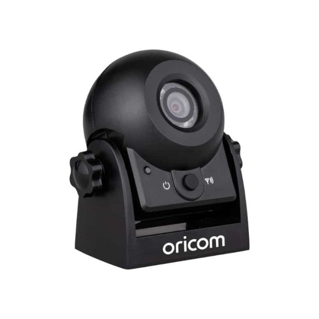 A black Oricom wireless camera with visible control buttons and a mounting bracket.