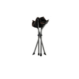Black camping stool folded up
on a white background