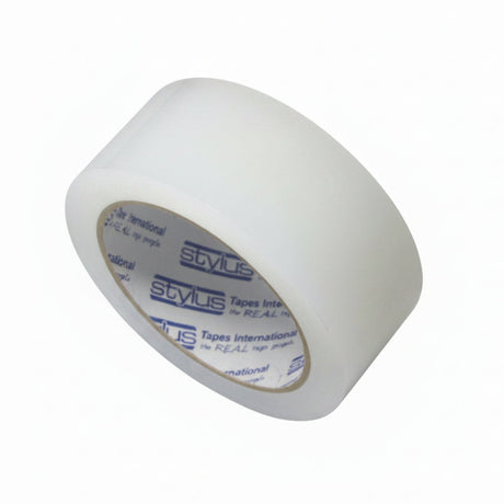 Clear repair tape roll on a white background .