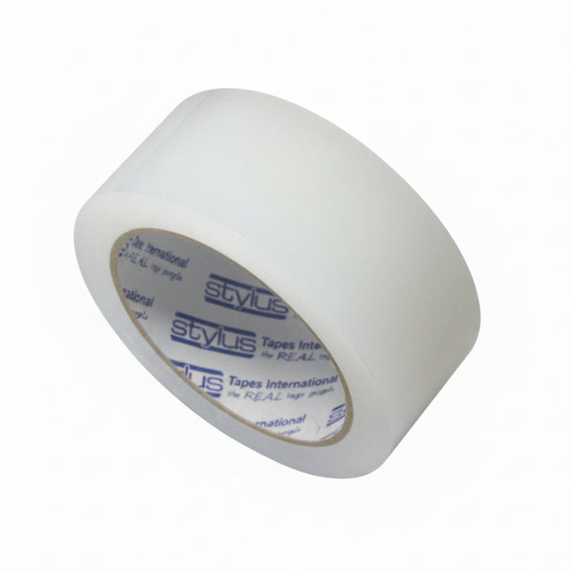 Clear repair tape roll on a white background .