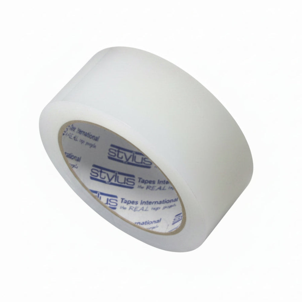 Clear repair tape roll on a white background .