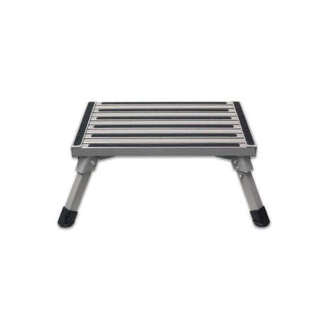 A folded aluminium step with non-skid surface and rubber feet, viewed from a slight angle.