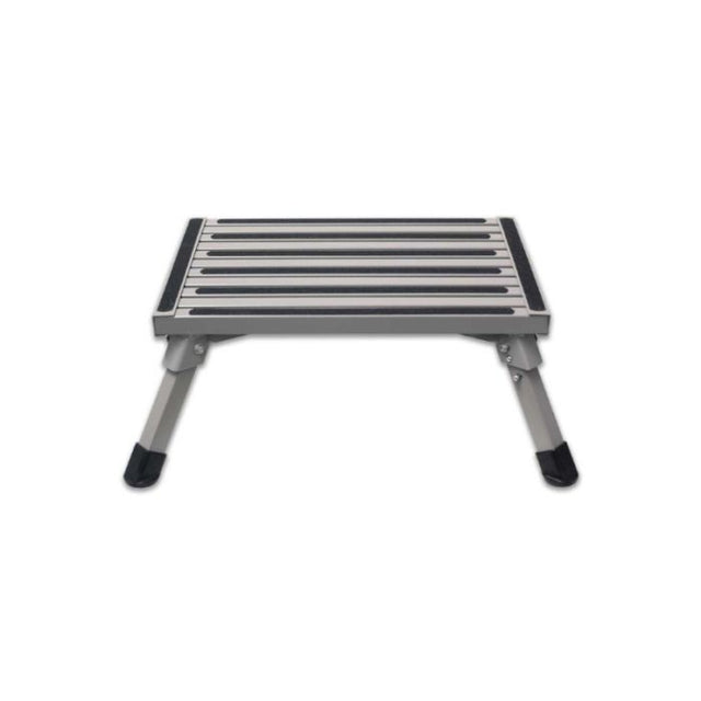 A folded aluminium step with non-skid surface and rubber feet, viewed from a slight angle.
