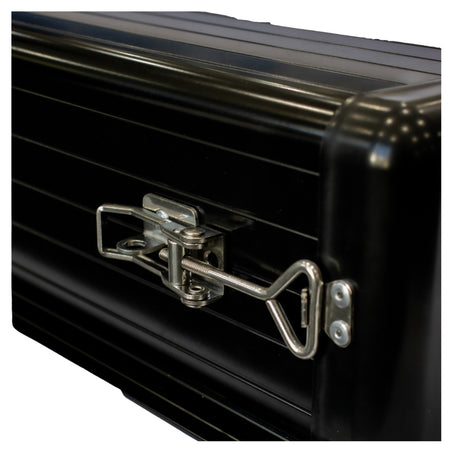 Close-up of a black metal pole carrier with a silver latch  closed on a white backgroun
