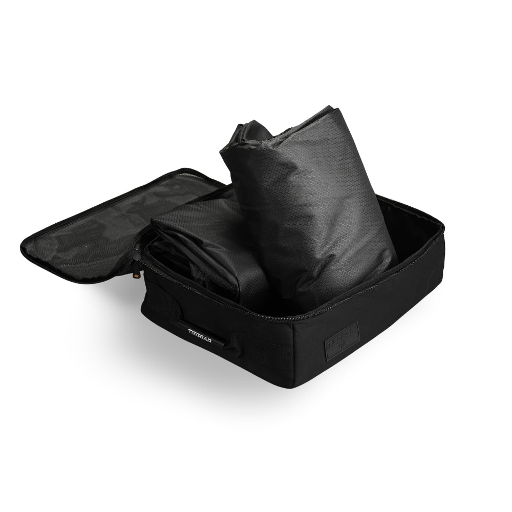 Black carry case with awning side walls folded inside